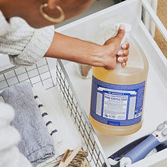 Dr. Bronner's peppermint hair wash foam for daily cleansing.