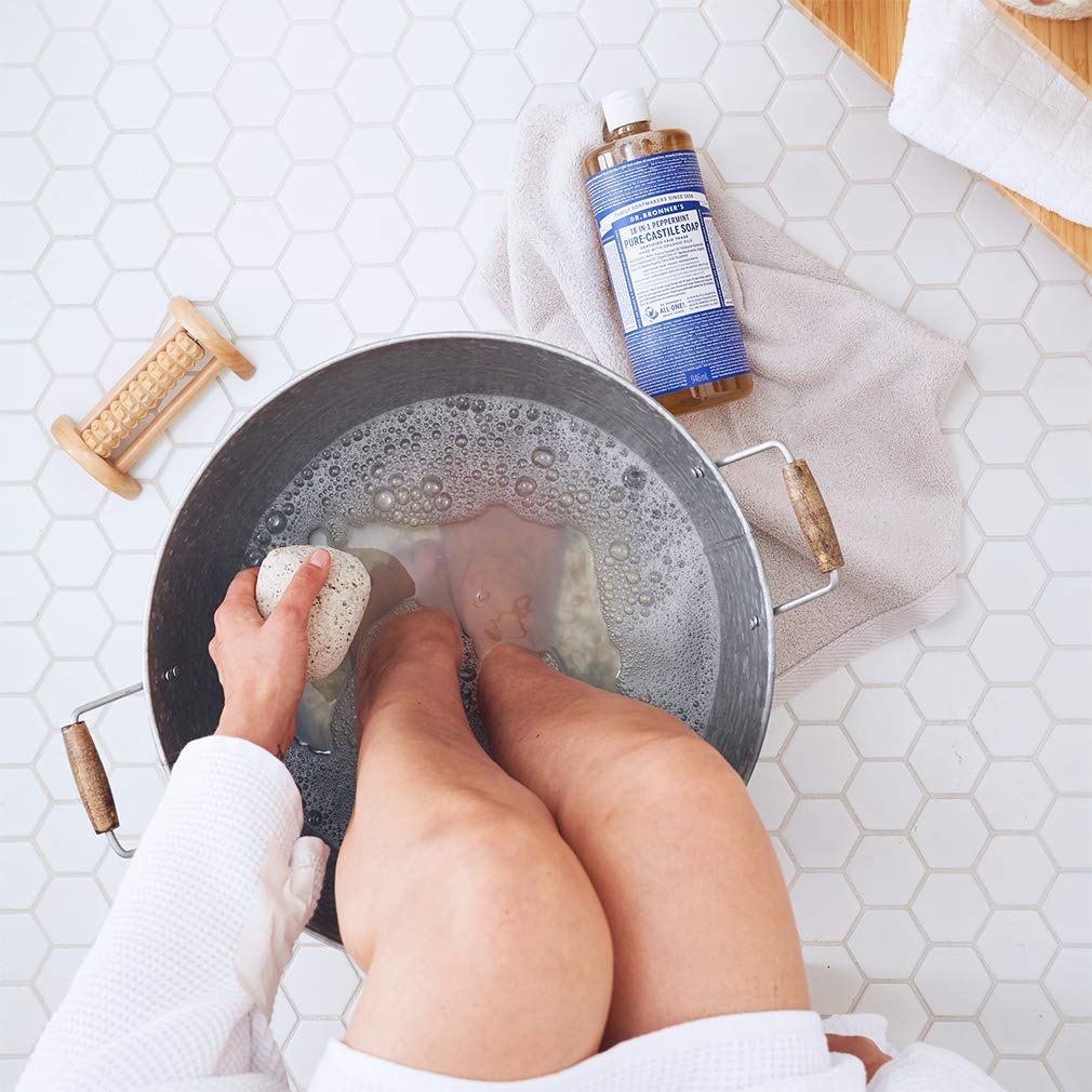 Dr. Bronner's Peppermint soap lather close-up—effortless foam for skin and hair
