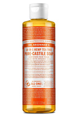 Dr. Bronner's Tea Tree Castile soap bottle pouring for versatile cleaning tasks