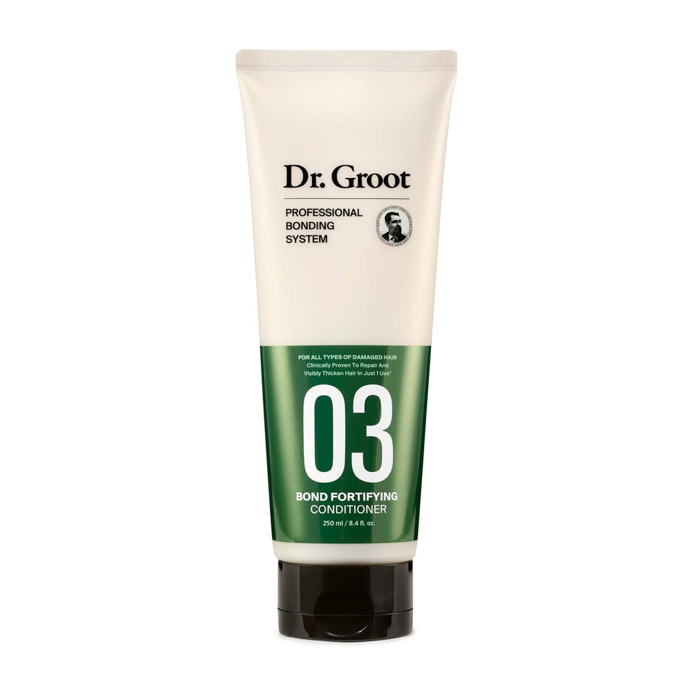 Dr. Groot Bond Fortifying Conditioner bottle closeup highlights hydrating formula for frizz reduction