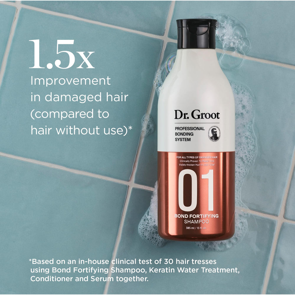 Dr. Groot Bond Fortifying Shampoo bottle being poured showing keratin and silk formula