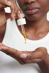 Dr. Hauschka Clarifying Day Oil being applied to face.
