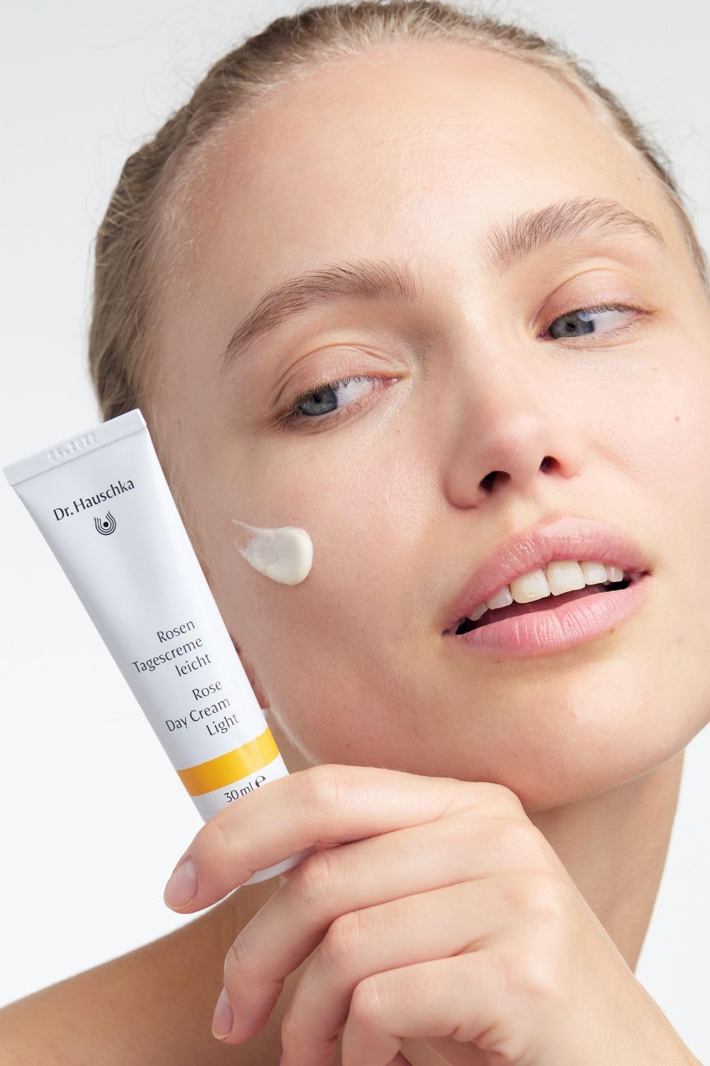 Dr. Hauschka Rose Day Cream Light cream swirl texture on skin