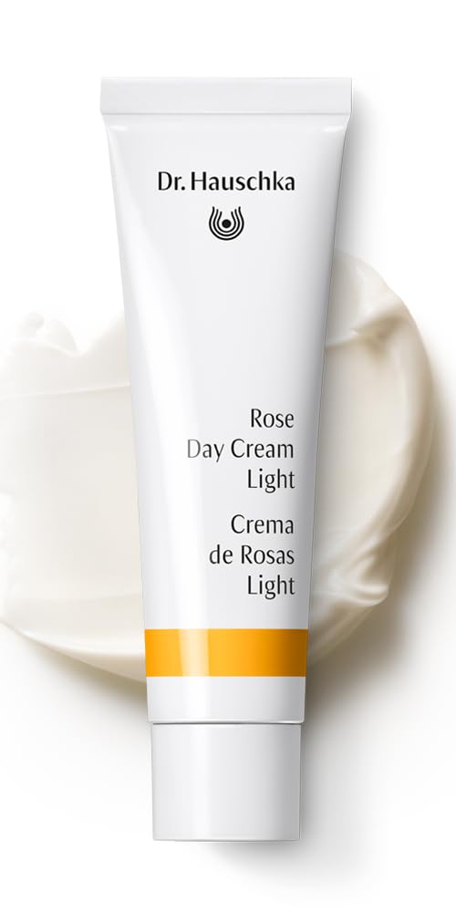 Dr. Hauschka Rose Day Cream Light hand applying cream on face