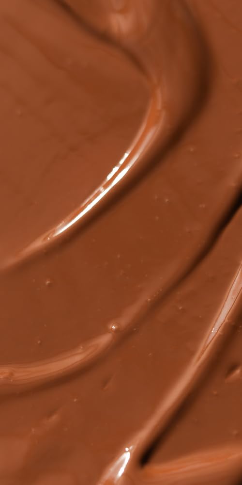 Dr. Hauschka Translucent Bronzing Tint application on cheeks delivers subtle, radiant warmth.