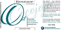 Dr Joe Lab rosehip oil bottle with rose petals evokes soothing routine.