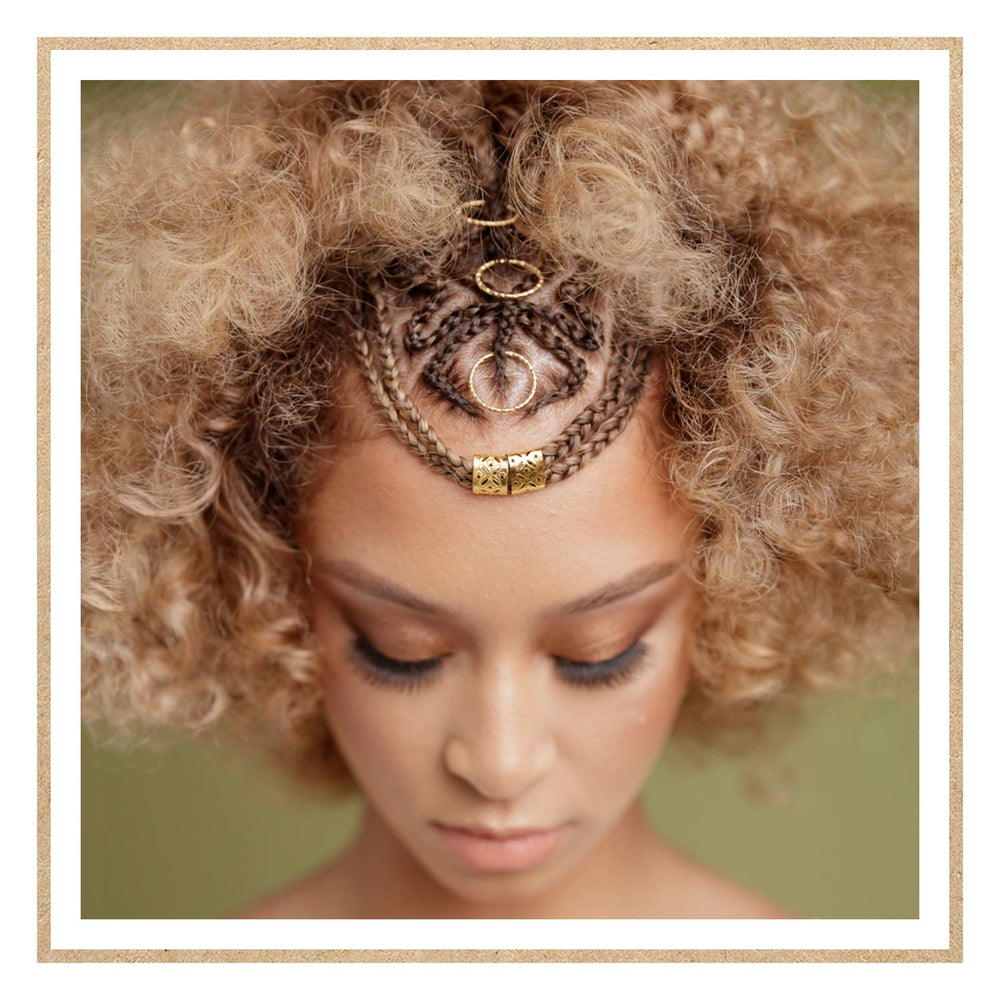 Dr. Miracle's Gro Oil hands-apply demonstrates soothing touch while hydrating strands and scalp.