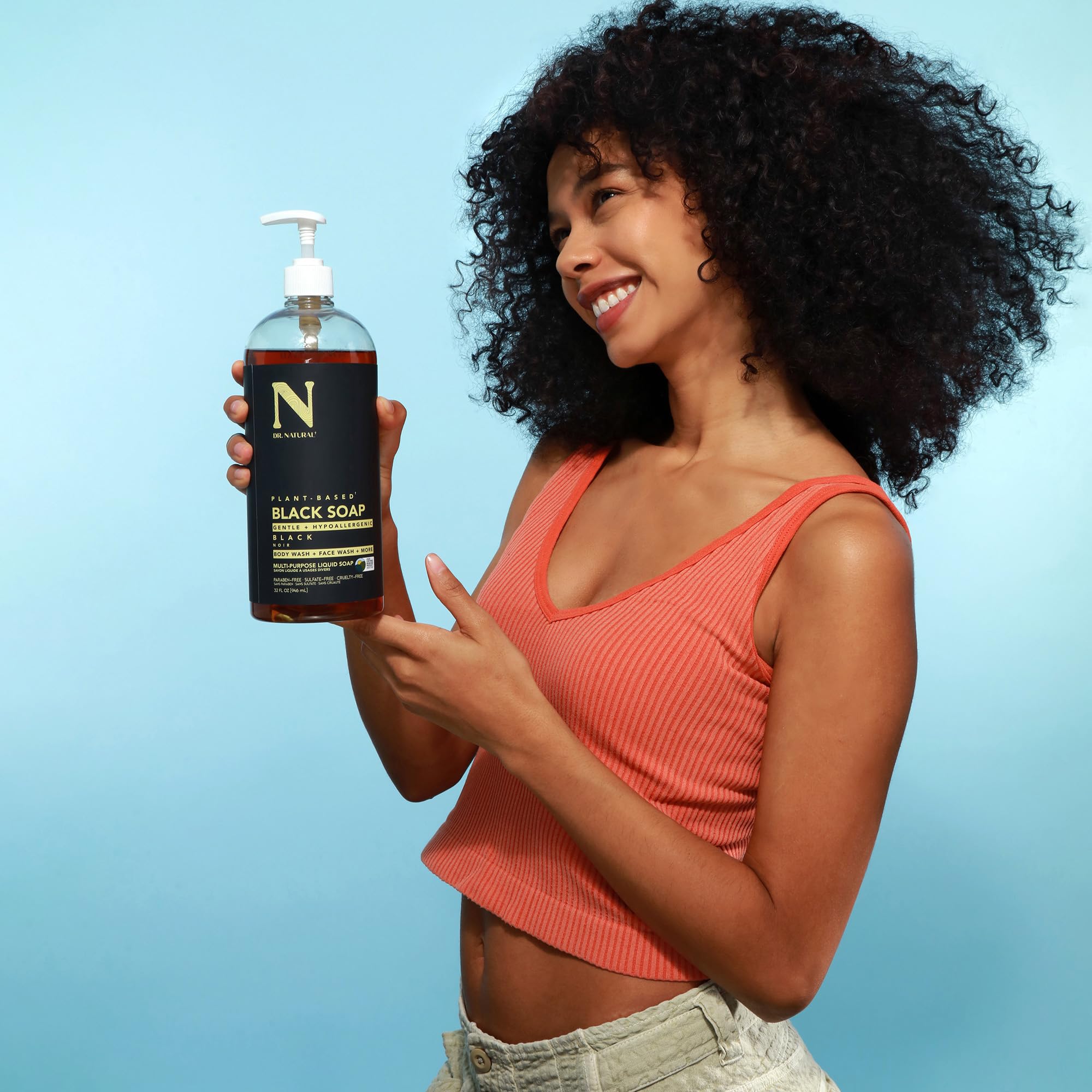Dr. Natural Black Liquid Soap lather closeup showing rich, moisturizing bubbles