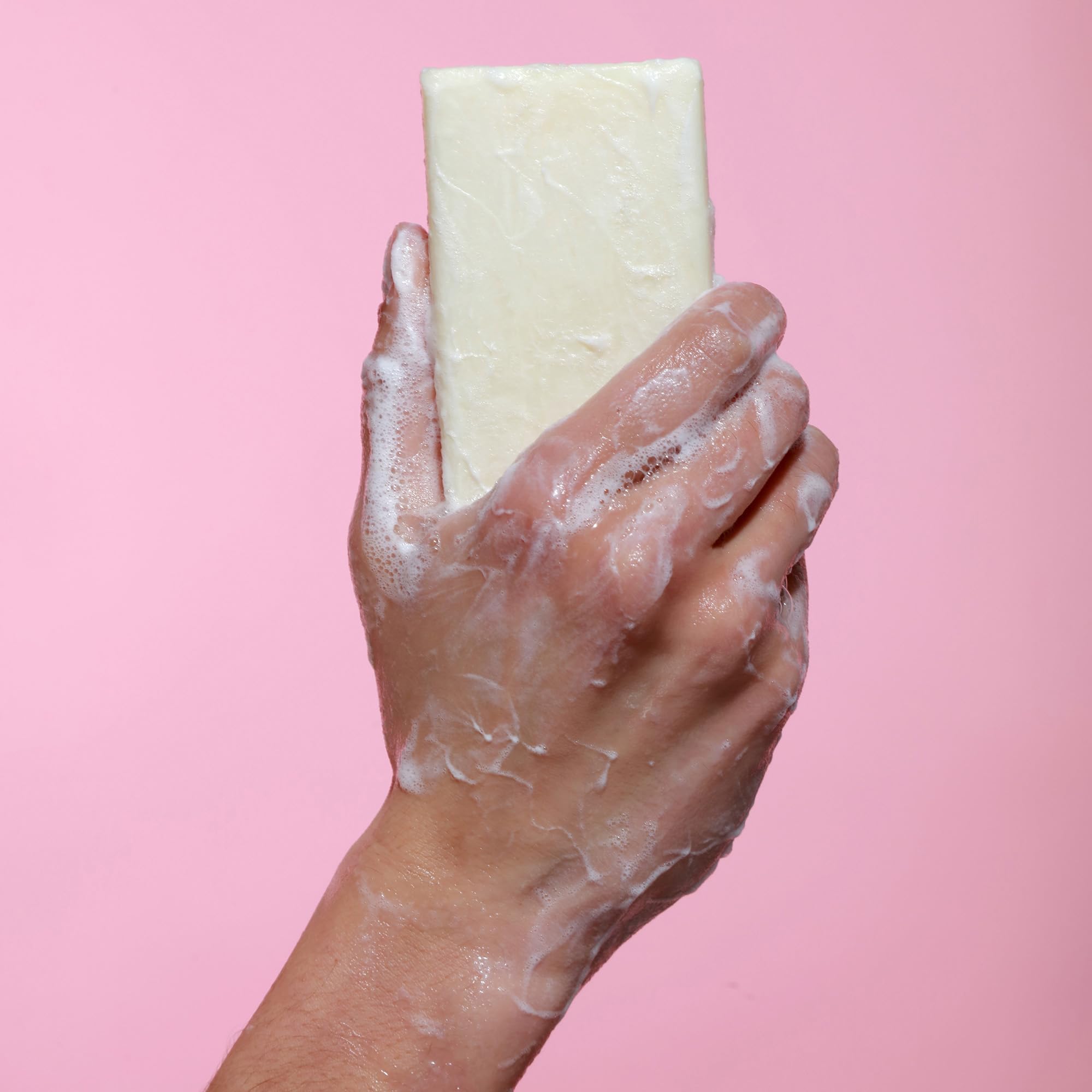Dr. Natural Pure Castile Almond bar cruelty-free logo close-up emphasizes ethical care.
