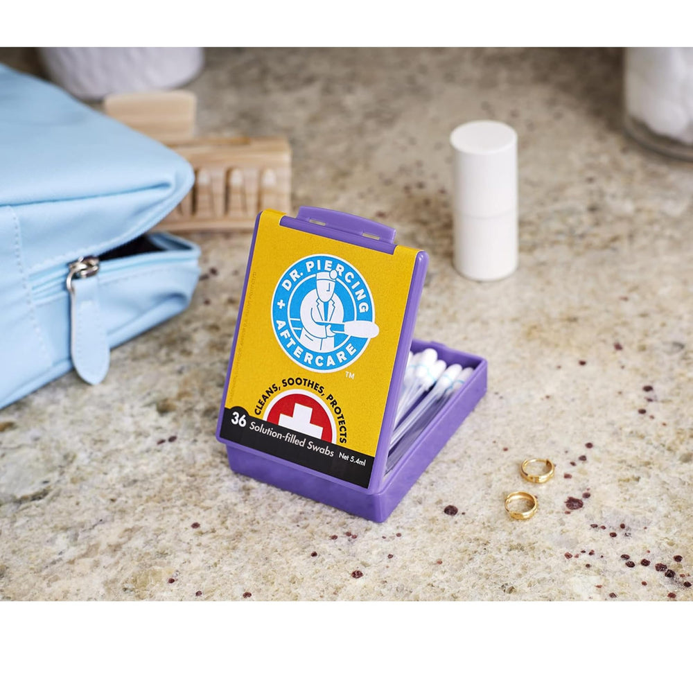 DR. PIERCING AFTERCARE compact case enables travel touchups on the go.