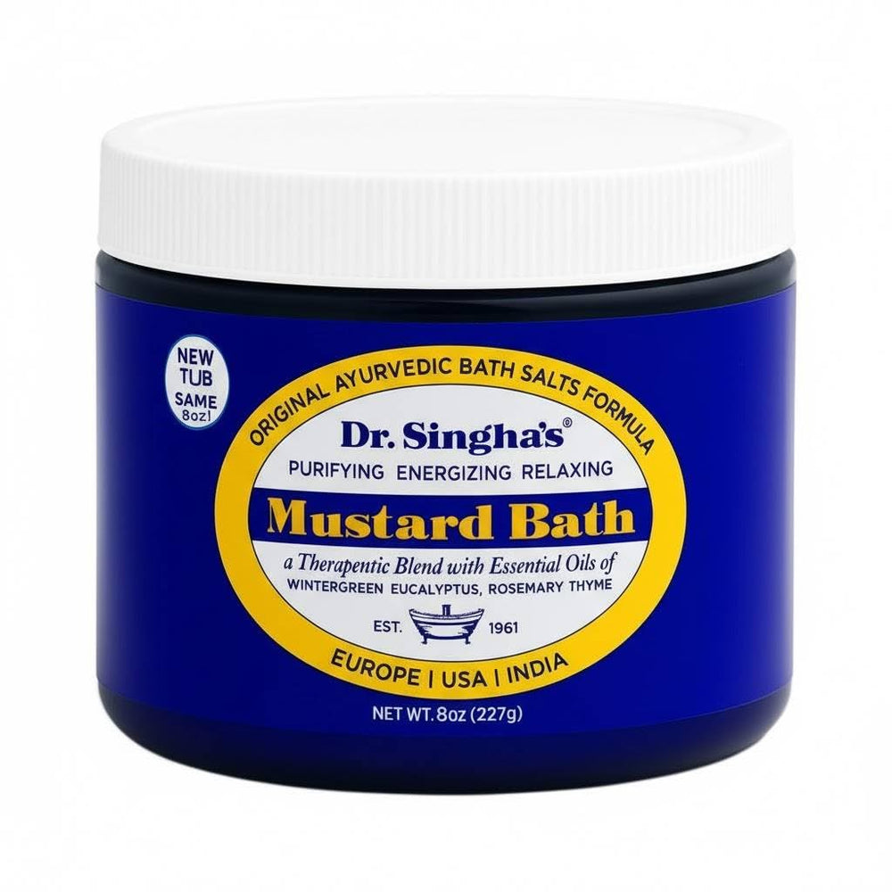 Dr. Singha's Mustard Bath Salts bottle in a spa setting for relaxation.