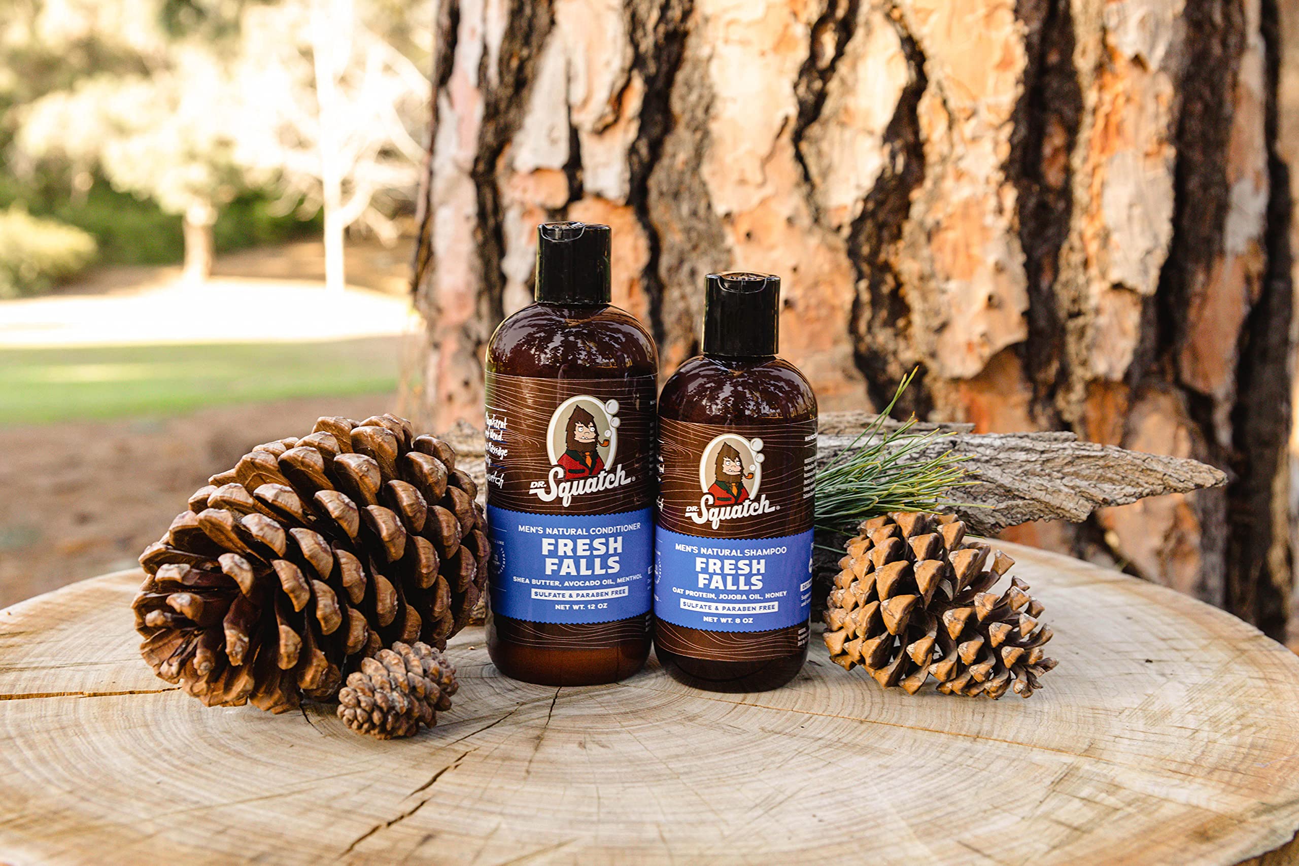 Dr. Squatch Fresh Falls Conditioner label closeup highlights burdock and tea tree for scalp comfort.