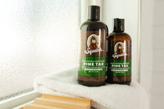 Dr. Squatch Pine Tar label closeup highlights rugged branding and pine-forward scent.