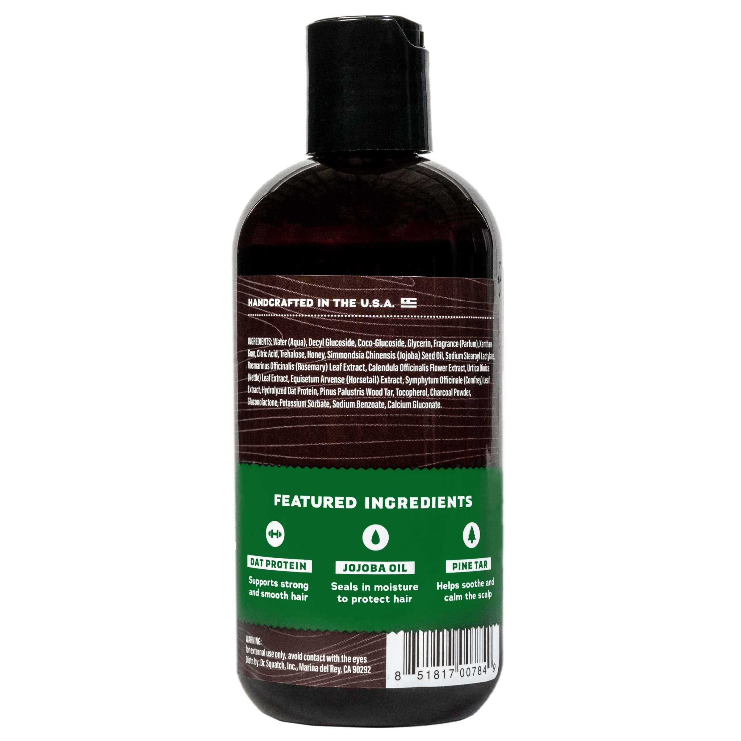 Dr. Squatch Pine Tar shampoo pour capturing the bold aromatic start to your shower.
