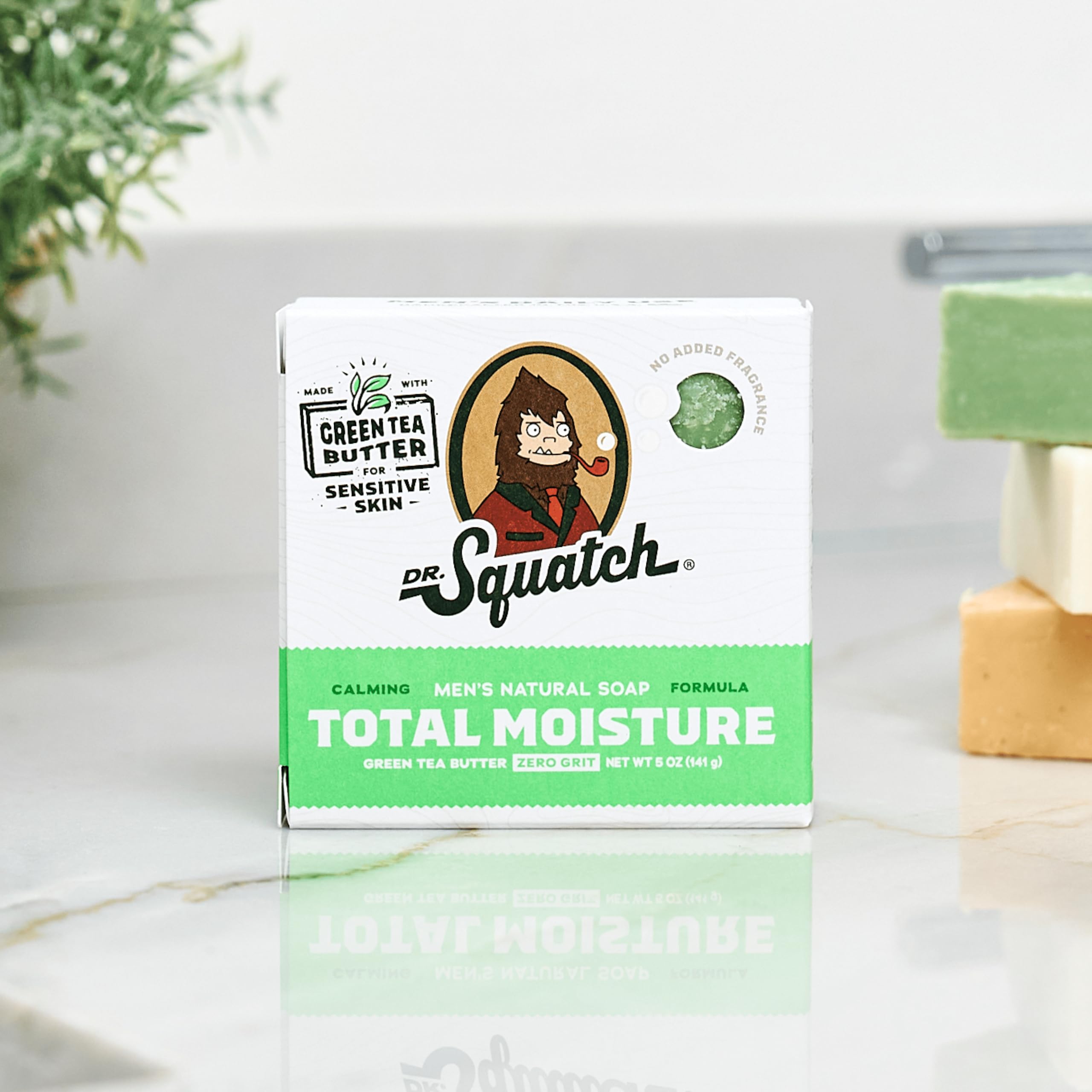 Dr. Squatch Total Moisture Bar Green Tea Butter slice shows rich lather and moisture.