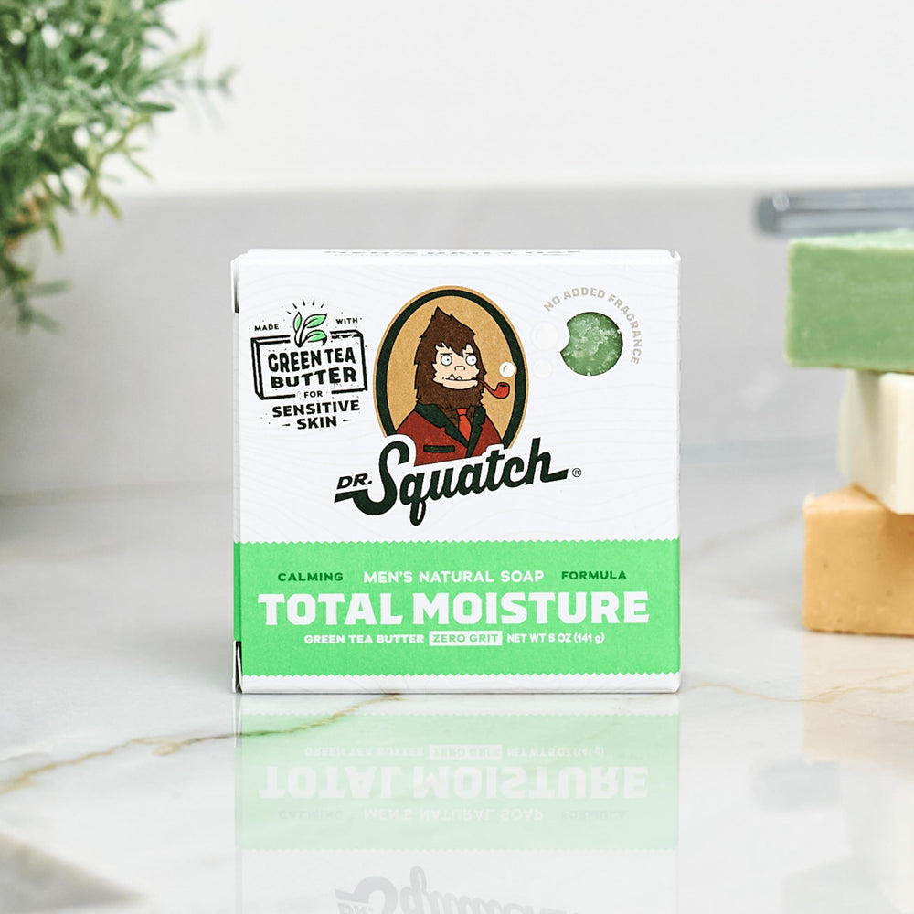 Dr. Squatch Total Moisture Bar Green Tea Butter slice shows rich lather and moisture.