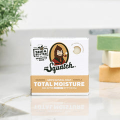 Dr. Squatch Total Moisture Bar Soap packaging featuring three bars with natural ingredients.