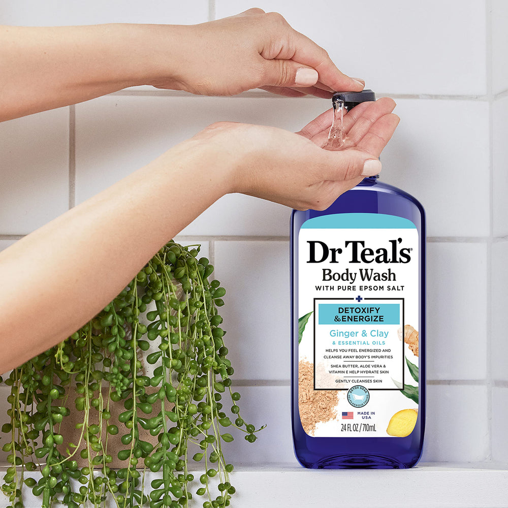 Dr Teal's Body Wash bottle pouring lather with ginger-clay aroma for refreshment.