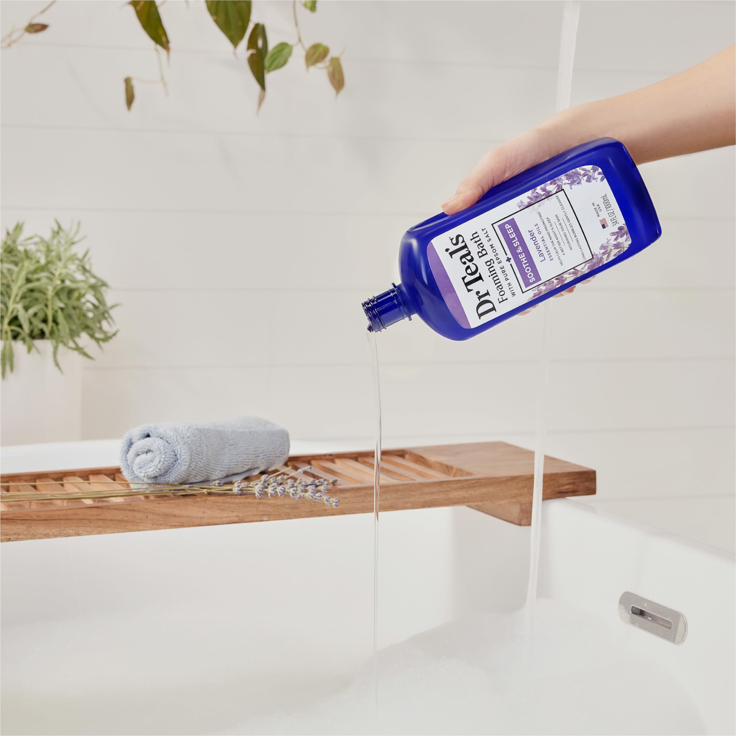 Dr Teal's Foaming bath bubbles closeup, creamy lather for stress relief