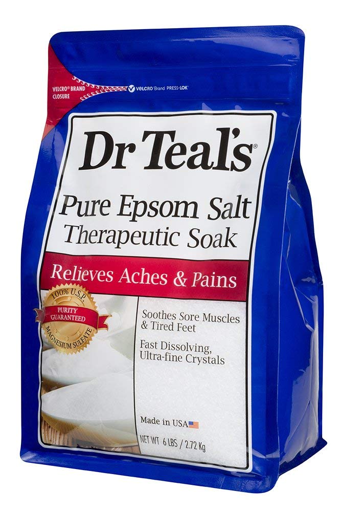 Dr Teal's Epsom salt bath in tub demonstrates soothing warmth for muscle comfort.