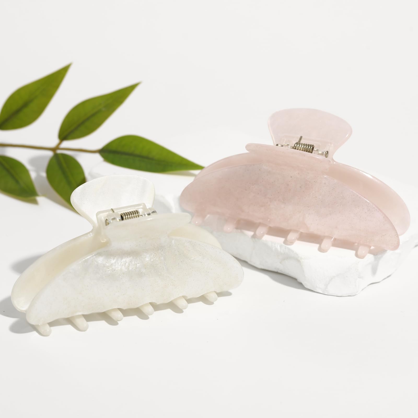 Drealoe white clip worn in daily outfits for a subtle elegant touch.