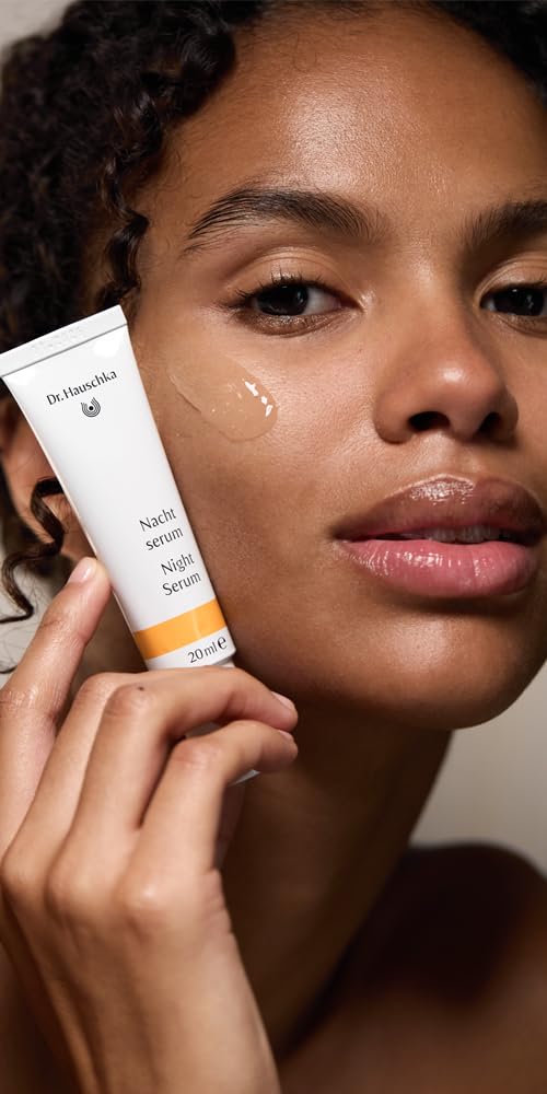 Dr. Hauschka Night Serum apple blossom extract detail—botanical balance during night routine.