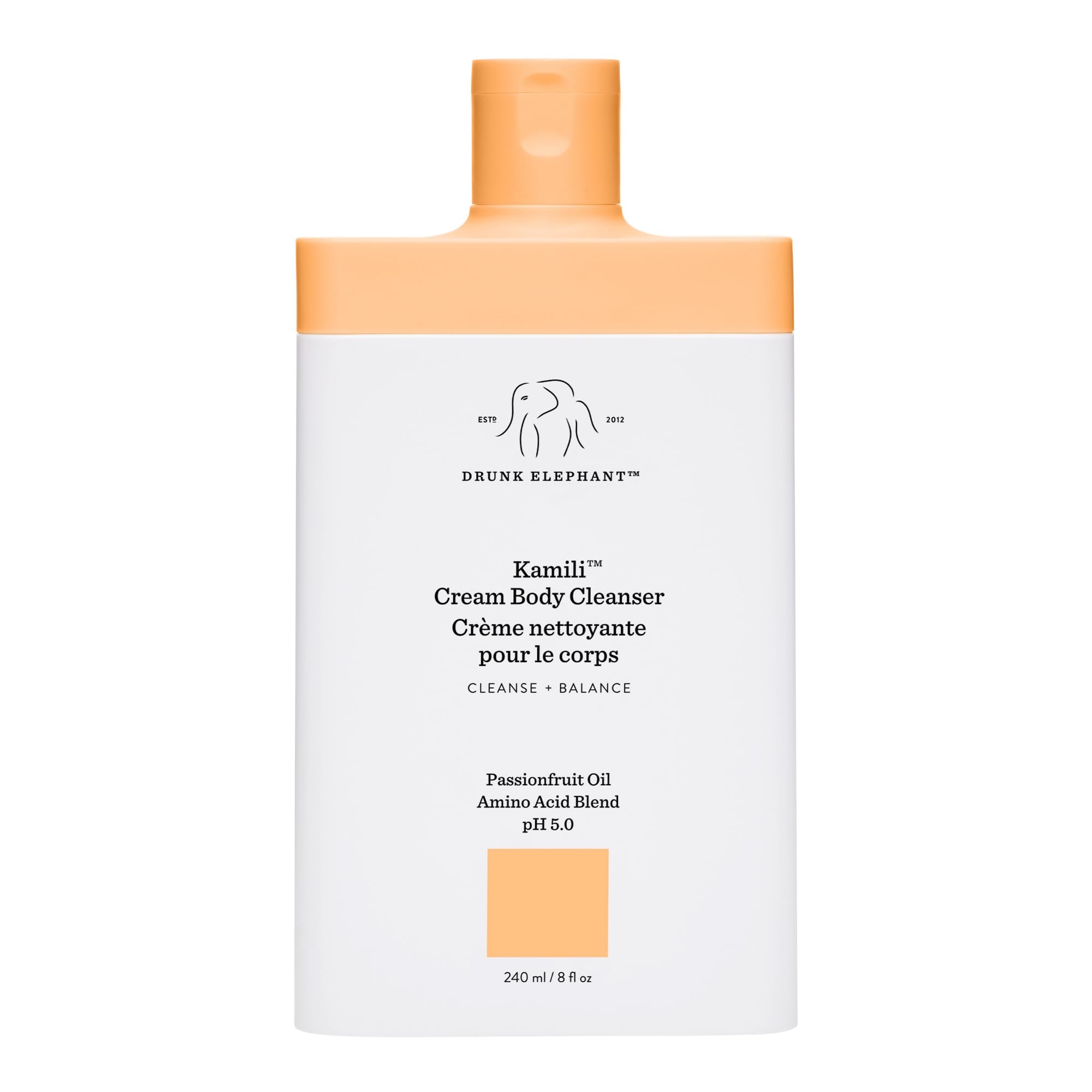 Drunk Elephant Kamili Cream Body Cleanser bottle closeup highlights gentle cleansing for sensitive skin