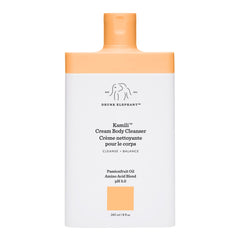 Drunk Elephant Kamili Cream Body Cleanser bottle closeup highlights gentle cleansing for sensitive skin
