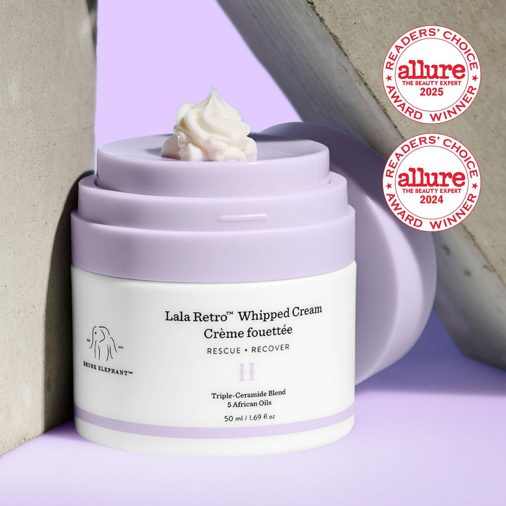 Drunk Elephant Lala Retro whipped cream jar close-up highlights fluffy texture for gentle moisturization.