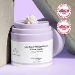 Drunk Elephant Lala Retro whipped cream jar close-up highlights fluffy texture for gentle moisturization.