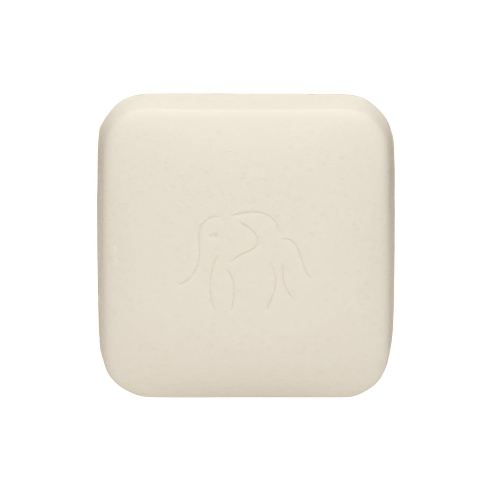 Drunk Elephant Pekee Bar lather closeup for gentle cleansing ritual