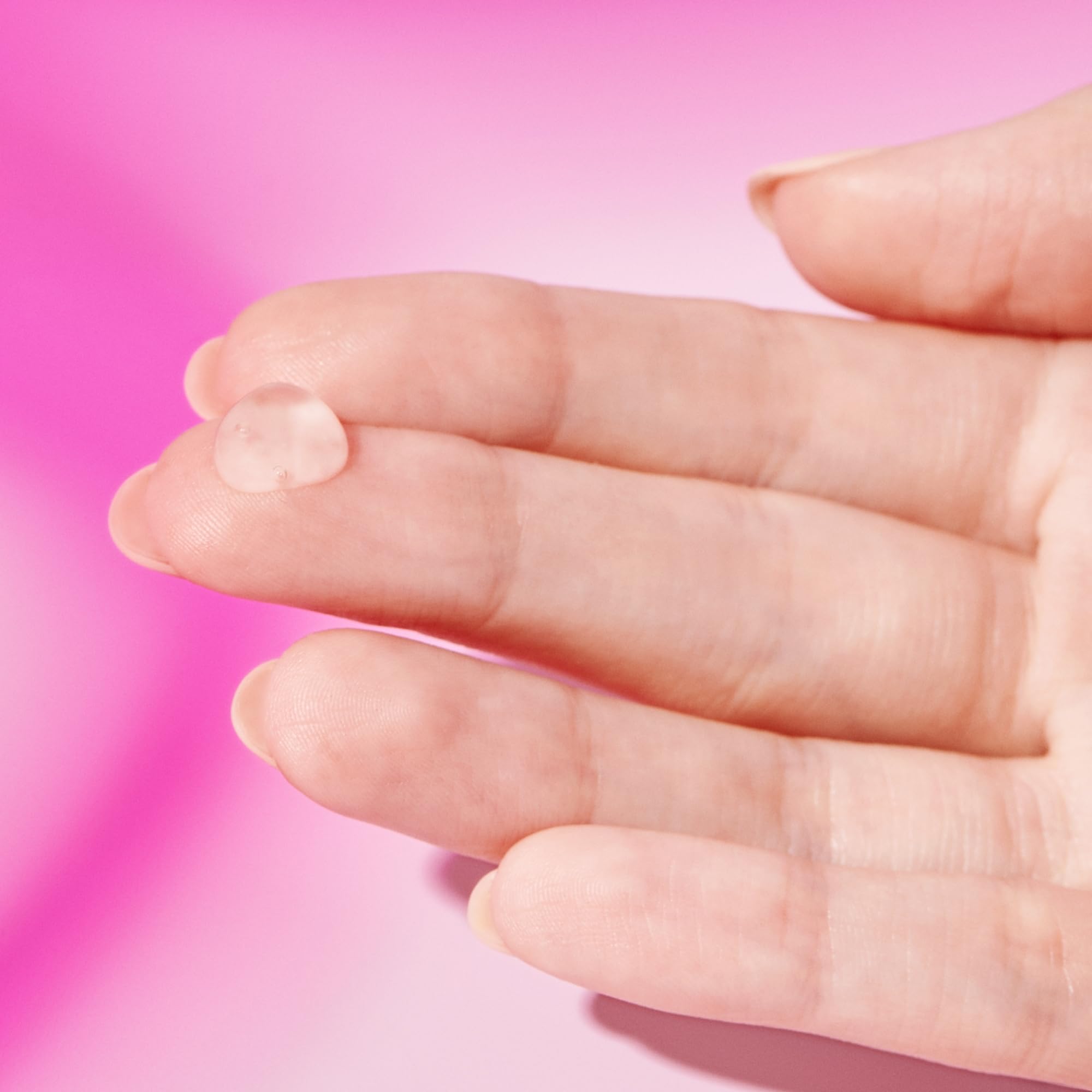 Drunk Elephant Framboos gel texture spread on skin for smoother skin.