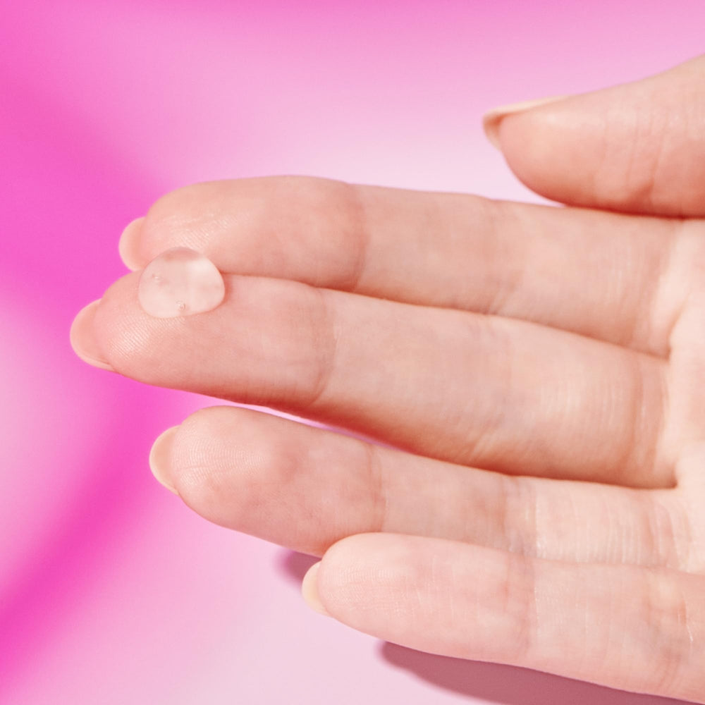 Drunk Elephant Framboos gel texture spread on skin for smoother skin.