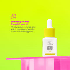 Drunk Elephant Virgin Marula Oil amber glass bottle signals premium nourishment.