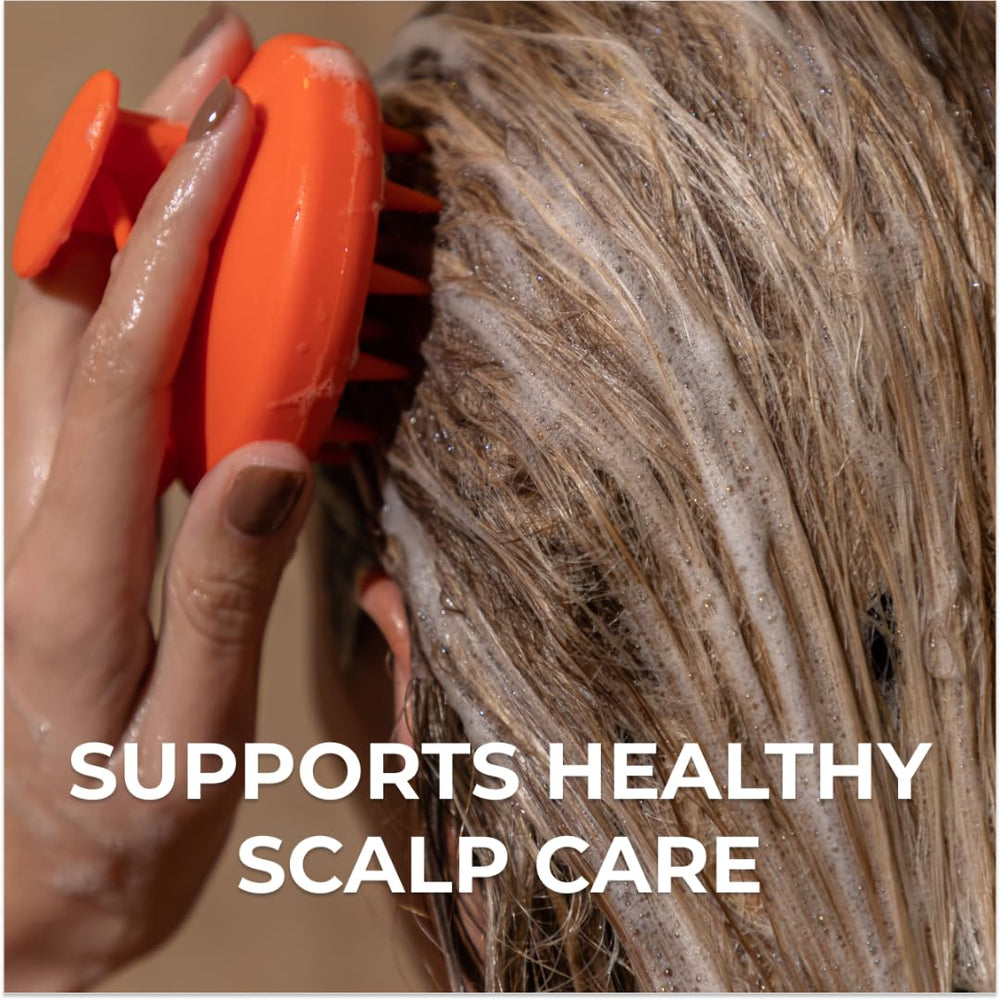 DS Laboratories Revitalizing Scalp Brush silicone-bristles creates rich lather for even shampoo distribution.