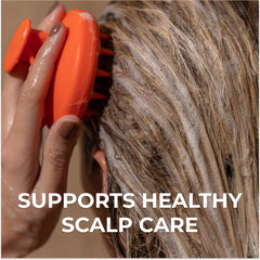 DS Laboratories Revitalizing Scalp Brush silicone-bristles creates rich lather for even shampoo distribution.