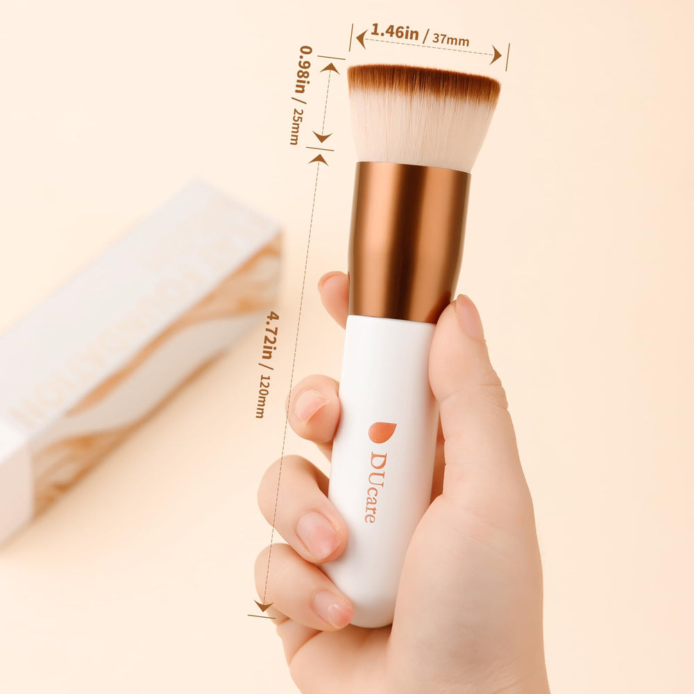 DUcare powder concealer blending for streak-free coverage.