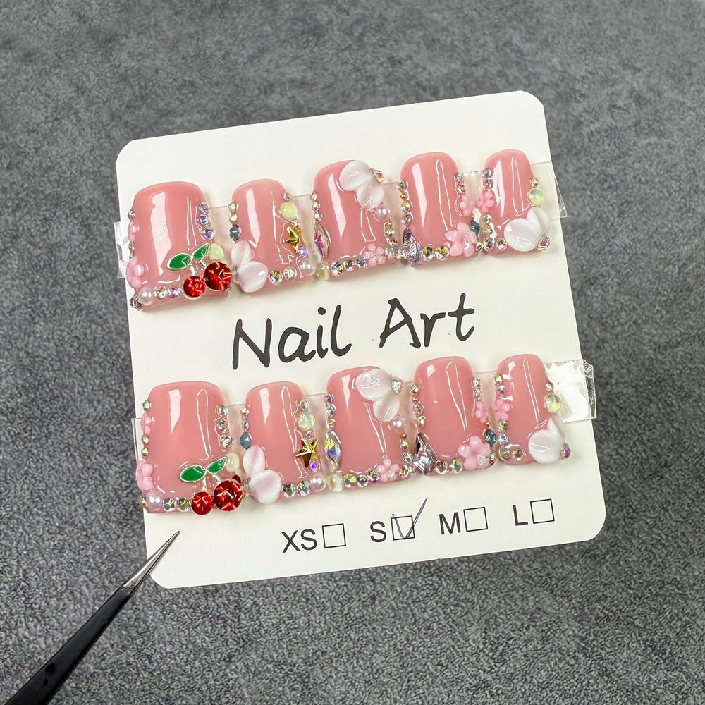Duck Press on Nails with pearl accents for chic sparkle.