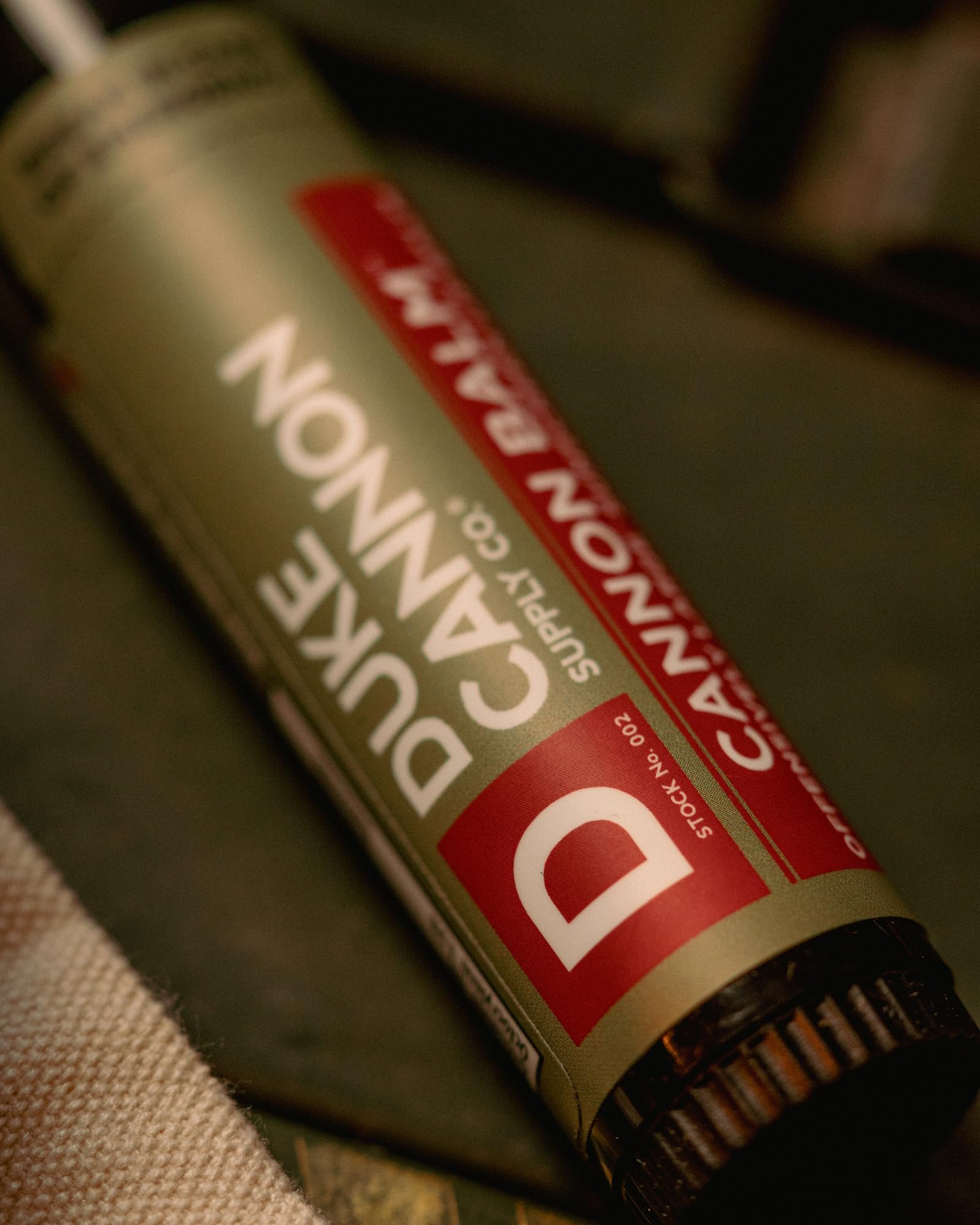 Duke Cannon Balm UV protection shields lips during sun-filled outdoor tasks.