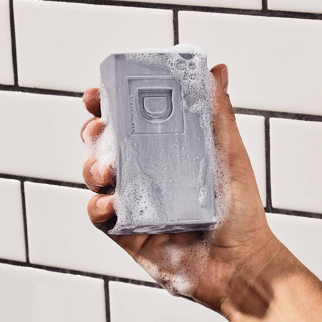 Duke Cannon big brick soap bars close-up shows coarse texture and lasting lather potential.