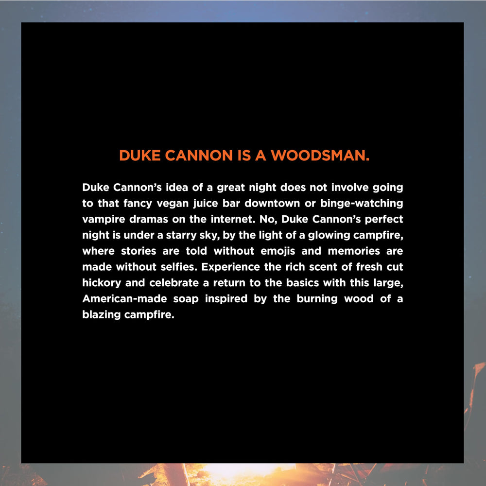 Duke Cannon big brick soap wooden surface image conveys rugged outdoor vibe and campfire mood