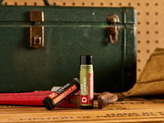 Duke Cannon Cannon Lip Balm 140° with blood orange mint for refreshing hydration on adventures.