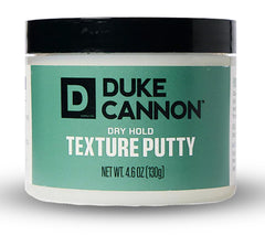Duke Cannon Dry Hold Putty packaging illustrating no-shine finish.