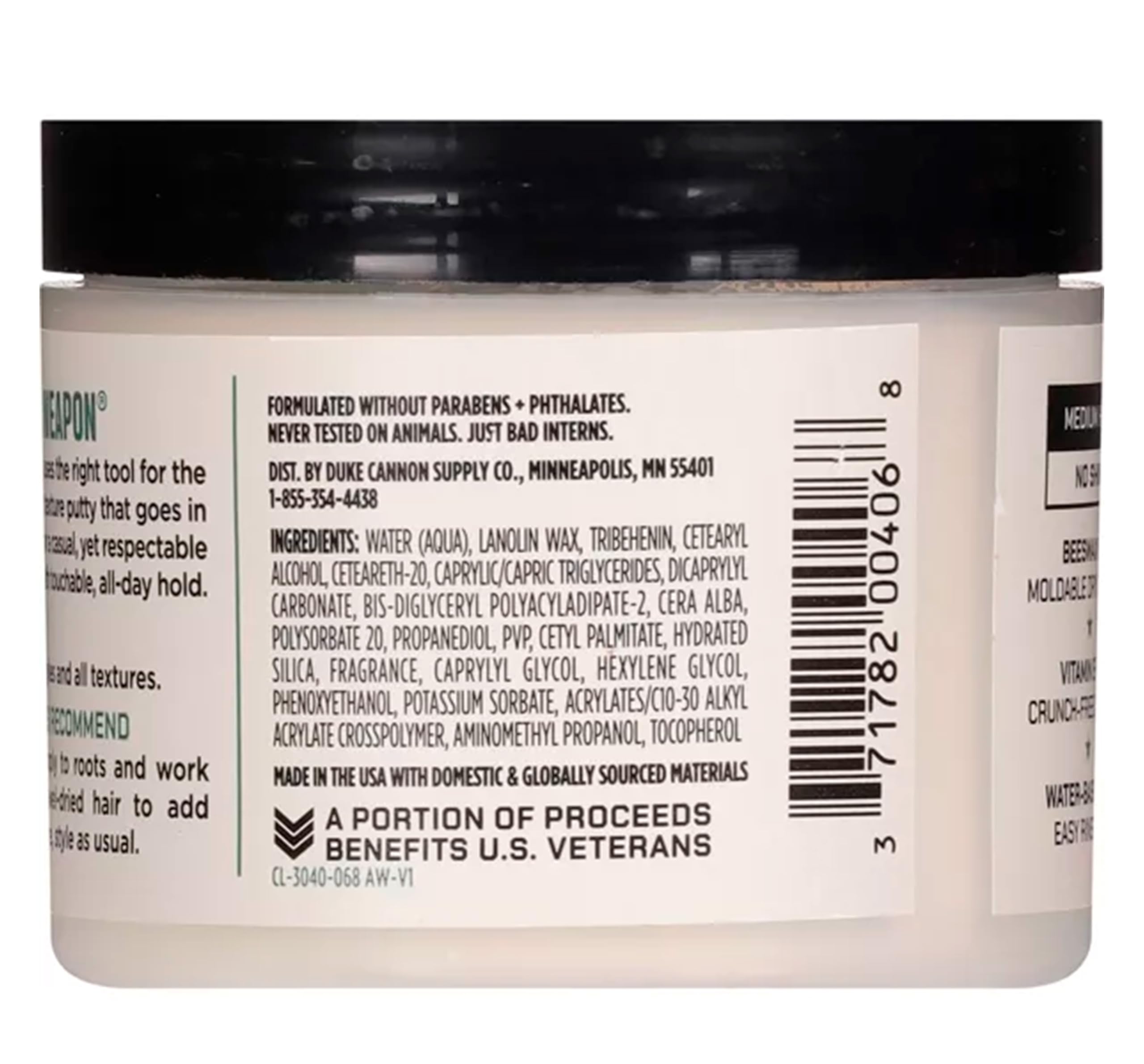 Duke Cannon Dry Hold Putty beside other styling products for a complete routine.