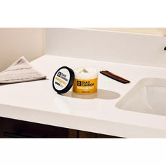 Duke Cannon Hurricane Hold Pomade tin back label highlighting water-based formula.