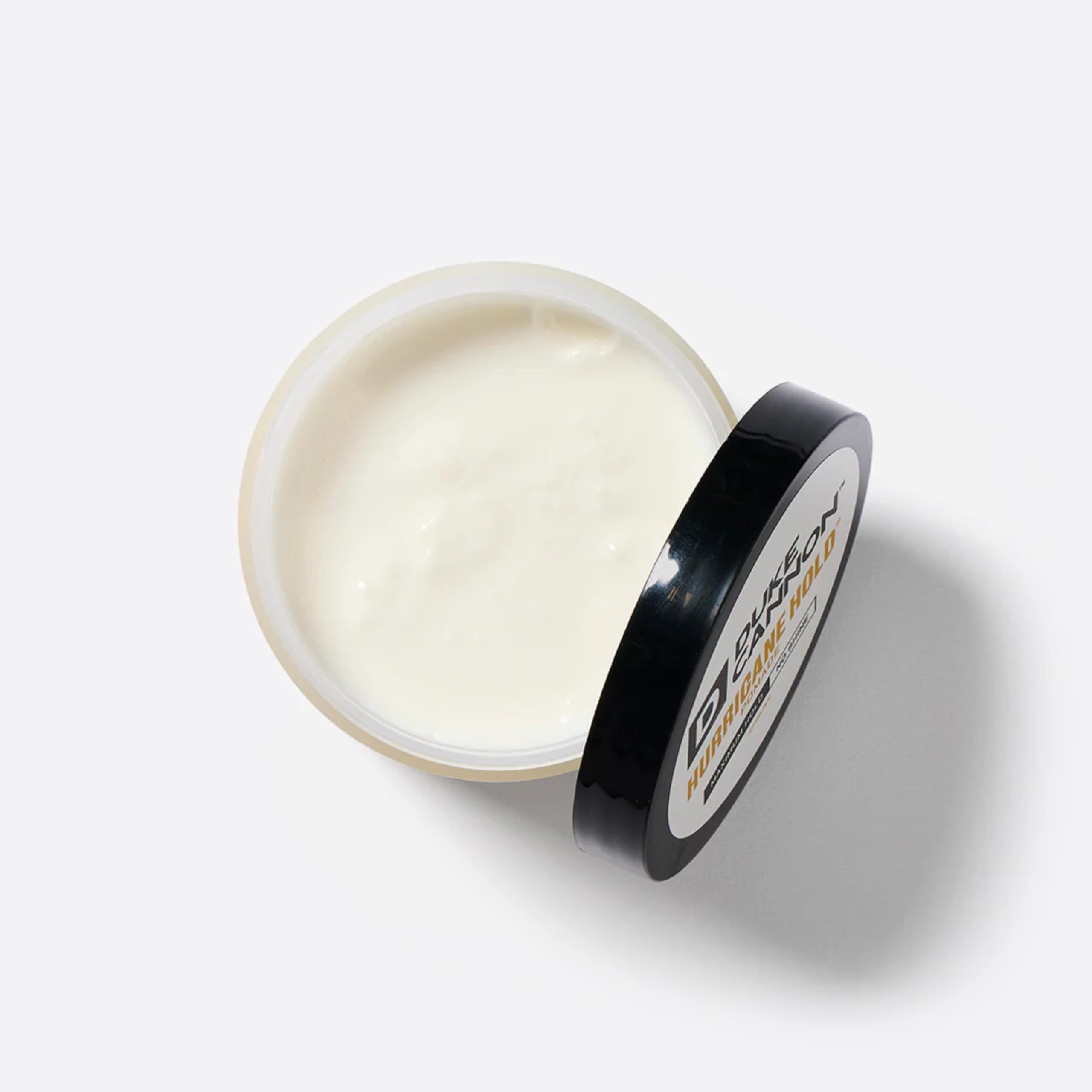 Duke Cannon Hurricane Hold Pomade rinse-out shows no greasy residue during wash.