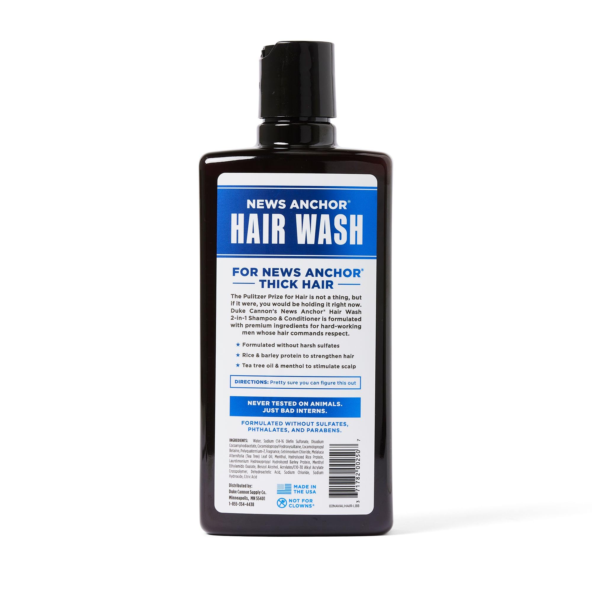 Duke Cannon News Anchor 2-in-1 Hair Wash label closeup highlights nourishing detangling formula