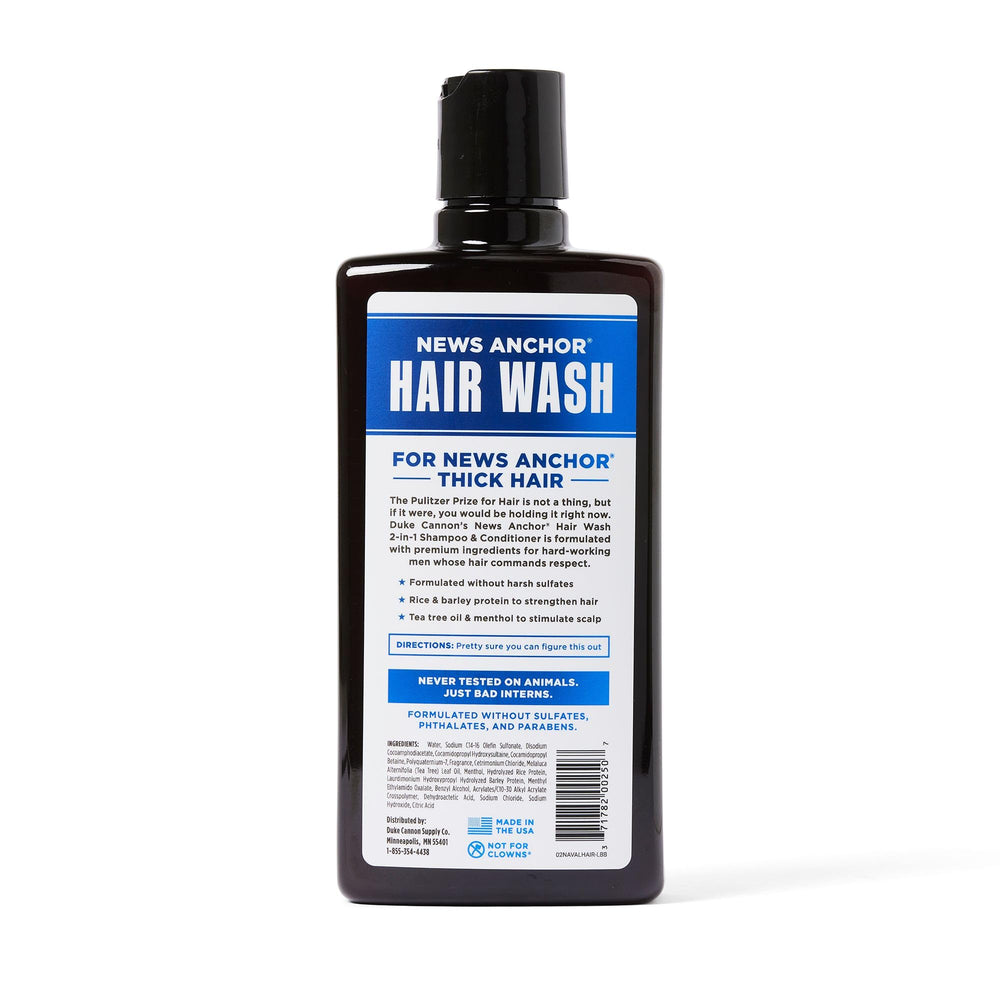 Duke Cannon News Anchor 2-in-1 Hair Wash label closeup highlights nourishing detangling formula