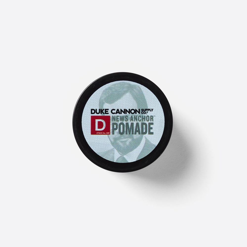 Duke Cannon News Anchor Pomade natural matte finish for clean, professional look.