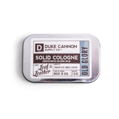 Duke Cannon Old Glory travel tin closeup for on-the-go freshness and easy carry.